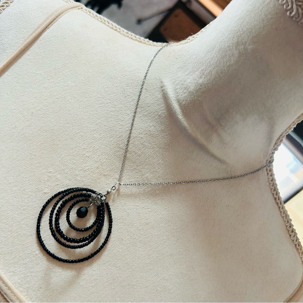 Handcrafted black seed bead ring pendant on chain necklace